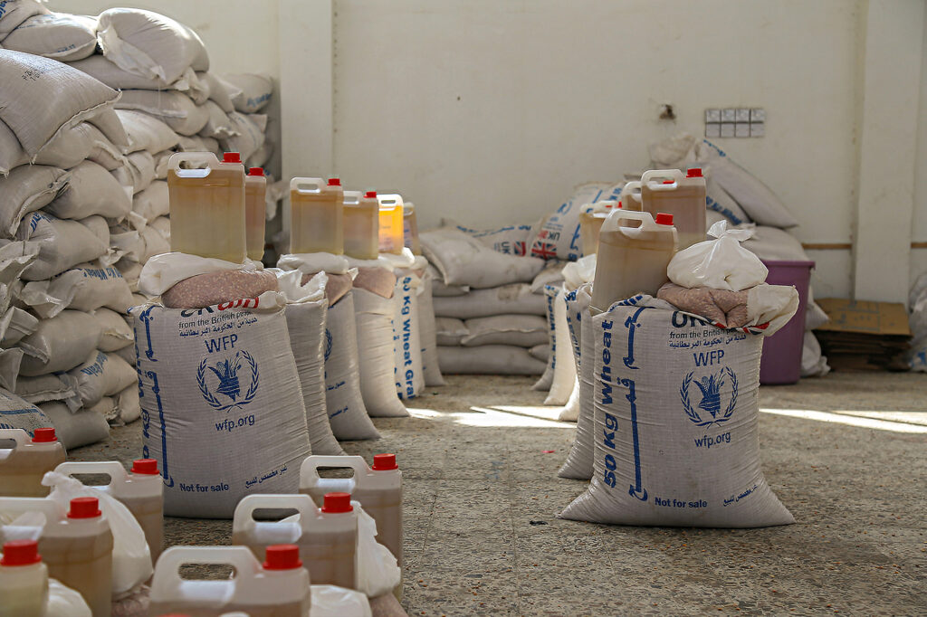Food aid awaits distribution at a warehouse in Taiz